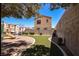 A shared green turf and playground create a fun place to live in this community at 1316 Oak Village Ave, Las Vegas, NV 89183