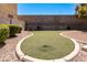 A lovely green turf area provides a perfect space for outdoor activities and relaxation at 1316 Oak Village Ave, Las Vegas, NV 89183