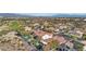 Overhead view of a residential area with pools, green spaces, and well-maintained homes at 1343 Panini Dr, Henderson, NV 89052