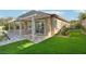 Covered back patio with ample space for seating and entertaining overlooking the backyard at 1343 Panini Dr, Henderson, NV 89052
