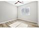 Bright bedroom with a ceiling fan and wood floors at 1343 Panini Dr, Henderson, NV 89052