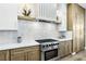 Modern kitchen featuring stainless steel appliances, granite countertops, and ample storage at 1343 Panini Dr, Henderson, NV 89052