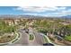 A beautiful neighborhood entrance features paved roads, landscaping, and a guard house at 1343 Panini Dr, Henderson, NV 89052