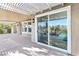 Spacious covered patio with a view of desert landscaping and a pool at 1343 Panini Dr, Henderson, NV 89052