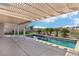 Beautiful backyard pool with lush landscaping and desert views at 1343 Panini Dr, Henderson, NV 89052