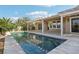 Beautiful pool area with lush landscaping at 1343 Panini Dr, Henderson, NV 89052