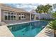 Backyard pool and patio area with covered patio perfect for entertaining at 1343 Panini Dr, Henderson, NV 89052