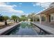 Inviting backyard pool with well maintained deck and desert views at 1343 Panini Dr, Henderson, NV 89052