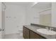 A clean, well-maintained bathroom features a granite countertop and modern fixtures at 1388 Graphite Ave, Henderson, NV 89002