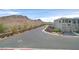 This street-level perspective captures the home's exterior and the surrounding desert landscape at 1388 Graphite Ave, Henderson, NV 89002