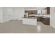 Spacious kitchen features stainless steel appliances, granite countertops and an island with ample storage at 1388 Graphite Ave, Henderson, NV 89002