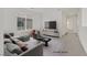 This virtually staged living room offers ample space and natural light, with contemporary furnishings at 1388 Graphite Ave, Henderson, NV 89002