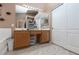 Bright bathroom with double sink vanity, large mirror, and convenient closet access at 1723 Anchor Dr, North Las Vegas, NV 89032