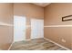 Neutral bedroom with wood-look floors and closet at 1723 Anchor Dr, North Las Vegas, NV 89032