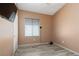 Bedroom with a window and wood-look flooring at 1723 Anchor Dr, North Las Vegas, NV 89032