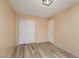 Bedroom with wood-look tile flooring and closet at 1723 Anchor Dr, North Las Vegas, NV 89032