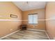 Minimalist bedroom with vaulted ceiling, and wood-look tile flooring at 1723 Anchor Dr, North Las Vegas, NV 89032