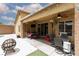 Covered outdoor patio with ceiling fans, ideal for dining and entertaining, next to a refreshing pool at 1723 Anchor Dr, North Las Vegas, NV 89032