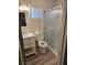 Bathroom featuring updated vanity and glass door at 1972 H St, Las Vegas, NV 89106