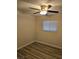 Neutral bedroom with ceiling fan, window with blinds, and light-colored floors at 1972 H St, Las Vegas, NV 89106