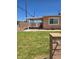 Charming single-story home featuring well-kept lawn and covered parking in a sunny setting at 1972 H St, Las Vegas, NV 89106