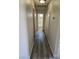 Hallway features wood-look flooring and access to the bathroom and other rooms at 1972 H St, Las Vegas, NV 89106