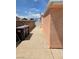 Side yard featuring a concrete walkway, providing a functional outdoor space at 1972 H St, Las Vegas, NV 89106