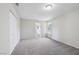 This carpeted bedroom has a large closet and a window for natural light at 204 Breeze St, Las Vegas, NV 89145