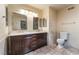 Bathroom featuring dual sinks, vanity with storage, and modern fixtures at 2486 Sabado St, Las Vegas, NV 89121