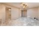 Bedroom featuring tiled floors and large closet with custom shelving at 2486 Sabado St, Las Vegas, NV 89121