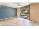 Bedroom with sliding glass door leading to backyard with patio at 2486 Sabado St, Las Vegas, NV 89121