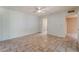 Spacious bedroom featuring tile floors, ceiling fan, and access to adjacent rooms at 2486 Sabado St, Las Vegas, NV 89121