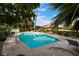 Sparkling community pool with lounge chairs at 2486 Sabado St, Las Vegas, NV 89121