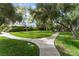 Well-manicured community grounds with walking path at 2486 Sabado St, Las Vegas, NV 89121