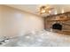 Living room featuring decorative stone fireplace and tile flooring at 2486 Sabado St, Las Vegas, NV 89121