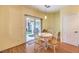 Cozy dining area includes sliding glass door and backyard views, perfect for casual meals and gatherings at 2561 Pyramid Pines Dr, Henderson, NV 89052