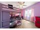 Bright bedroom with a loft bed, laminate floors, and dual pane windows at 2571 N David St, Pahrump, NV 89060