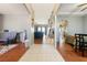Spacious hallway connecting living spaces with views of dining, kitchen, and living rooms at 2571 N David St, Pahrump, NV 89060