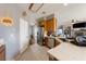 Bright kitchen featuring tile floors, stainless steel appliances, and wood cabinets at 2571 N David St, Pahrump, NV 89060