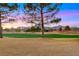 The backyard view features a golf course with sparse trees and desert mountains in the distance at 2621 Spalding Dr, Las Vegas, NV 89134