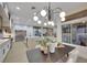 Bright and airy kitchen featuring a spacious island, stainless steel appliances, and seamless flow into the adjacent living area at 2621 Spalding Dr, Las Vegas, NV 89134