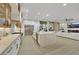 Open-concept kitchen with a large island, stainless appliances, and view into the living area at 2621 Spalding Dr, Las Vegas, NV 89134