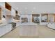 Modern kitchen featuring a large island, stainless steel appliances, and custom cabinetry at 2621 Spalding Dr, Las Vegas, NV 89134