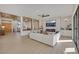 Open-concept living room with wood-paneled ceiling, modern fireplace, and seamless indoor/outdoor flow at 2621 Spalding Dr, Las Vegas, NV 89134