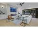Contemporary living room features a sleek fireplace, large TV, and comfortable seating area at 2621 Spalding Dr, Las Vegas, NV 89134
