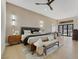 Luxurious bedroom featuring decorative lighting, a large bed, and sitting area at 2621 Spalding Dr, Las Vegas, NV 89134