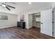 Bedroom featuring closet, overhead fan, hardwood floors and decorative shelving at 2909 Gilmary Ave, Las Vegas, NV 89102