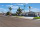 Charming single-story home featuring a putting green and modern garage door at 2909 Gilmary Ave, Las Vegas, NV 89102