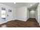 Bright foyer with wood floors, a glass-paneled front door, and neutral paint at 2909 Gilmary Ave, Las Vegas, NV 89102