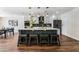 Spacious kitchen island with seating for four and modern pendant lighting at 2909 Gilmary Ave, Las Vegas, NV 89102